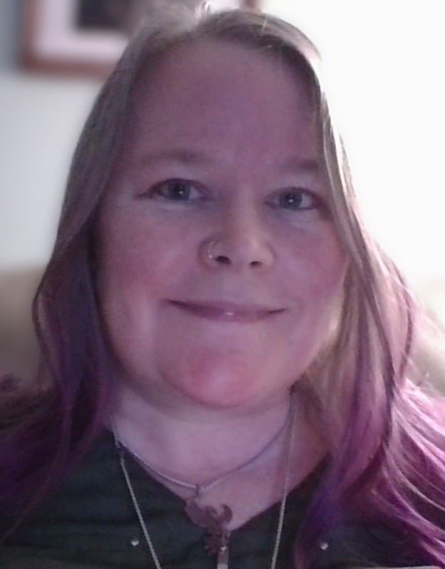 Elizabeth Ormes, MA LCPC, trauma therapist in Joliet, IL, smiling